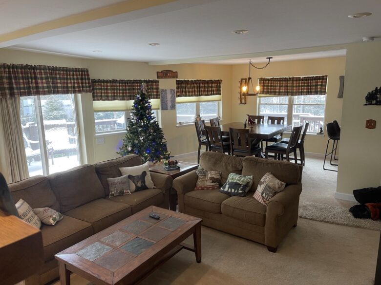 The living room and dining area, open to each other