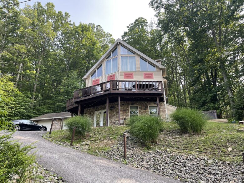 The chalet from the driveway in summer