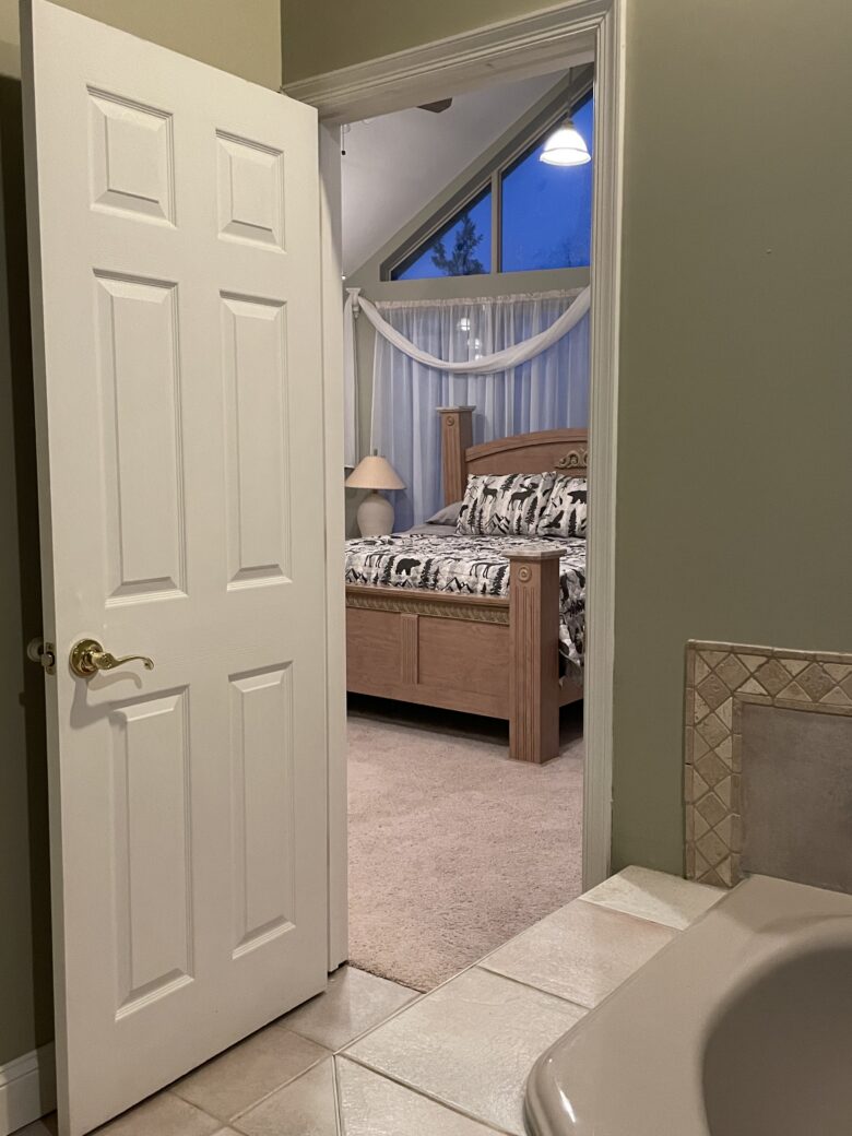 The Upstairs Master Suite seen from its own bathroom doorway