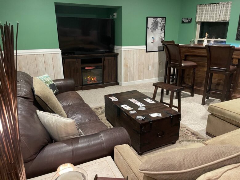 The lower level: television, fireplace and the sectional